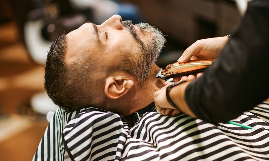 barber-trims-the-beard-of-the-customer.jpg barber-trims-the-beard-of-the-customer.jpg
